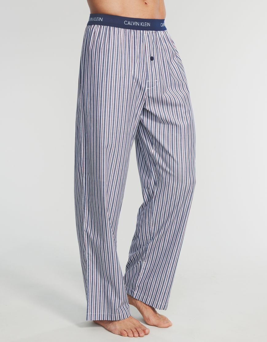 Kalhoty dlouhé U1197A - Calvin Klein